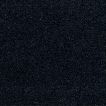 Navy fabric sample with dense, nubby texture; tightly woven construction suggests wool or blend, exhibiting subtle tonal variations.